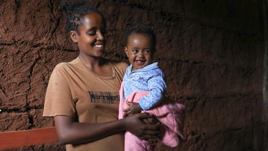 Lemlem holds her daughter Mariam in her arms.